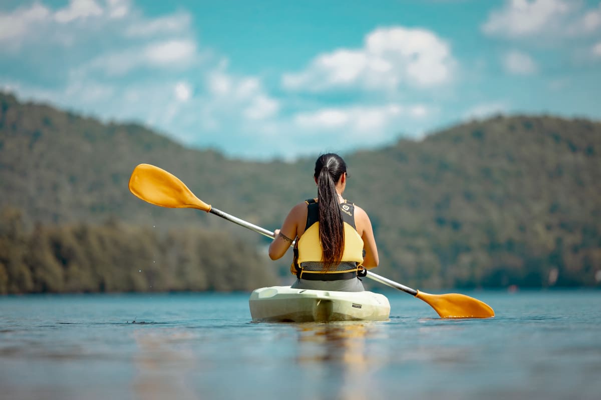 Grand Lodge Mont-Tremblant - Woman in a kayak