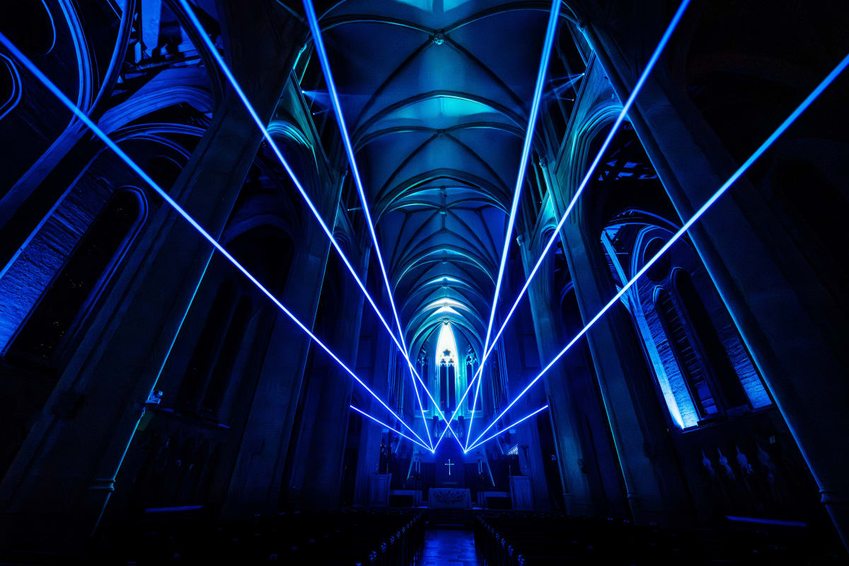 Beams of light during the AURA experiment at Grace Cathedral.