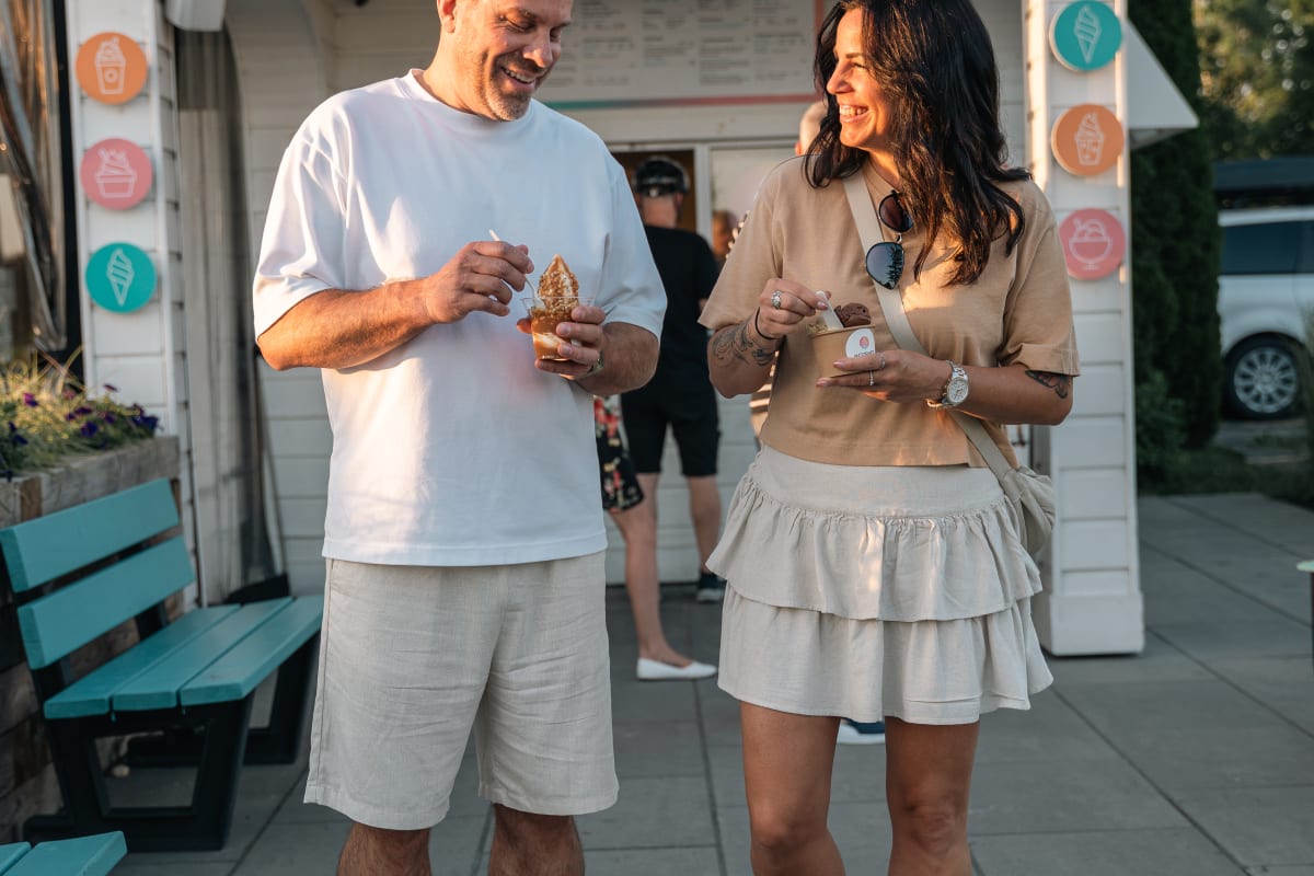 A couple eating a sundae at Le Cornet in Magog.
