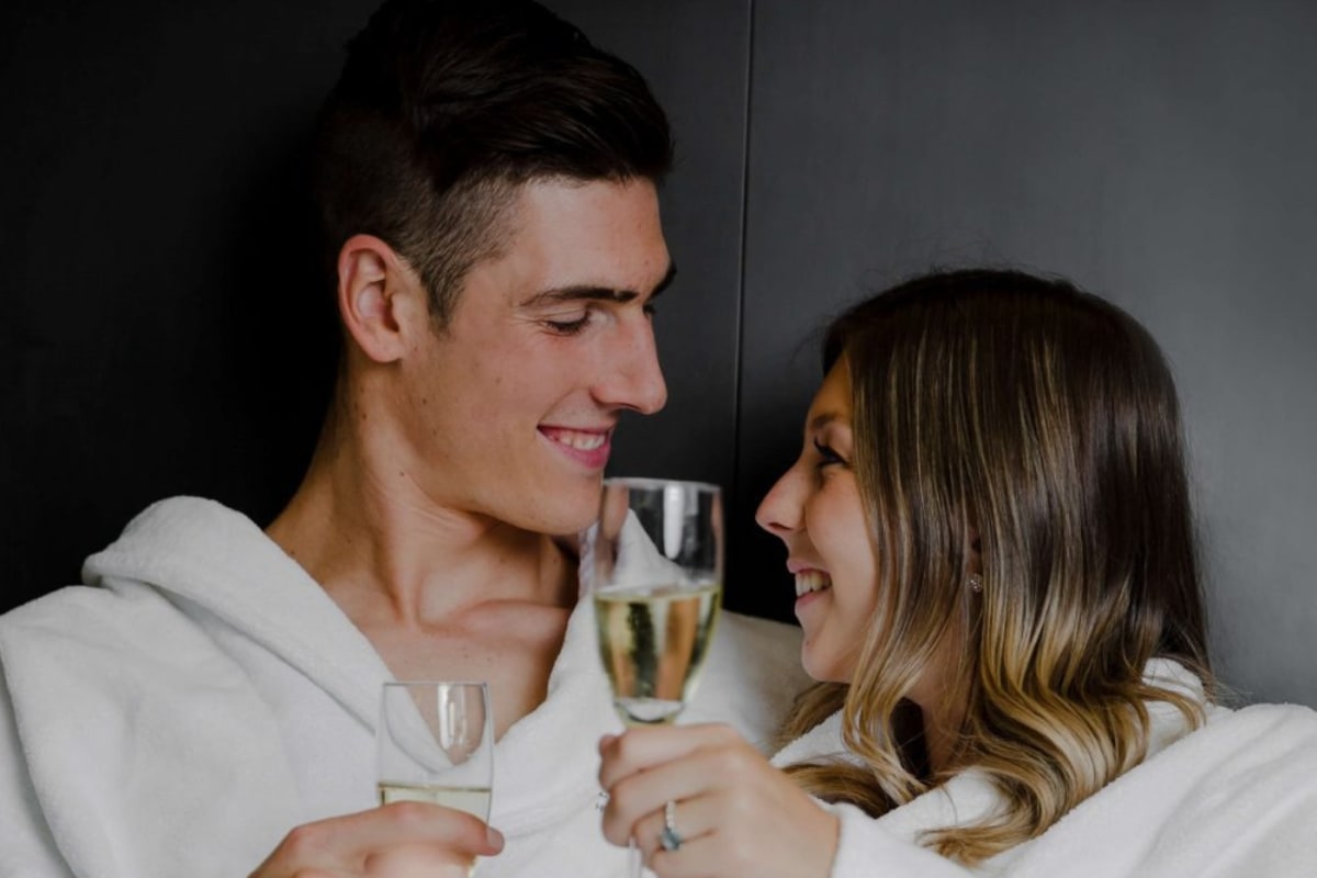 Couple holding glasses of sparkling wine