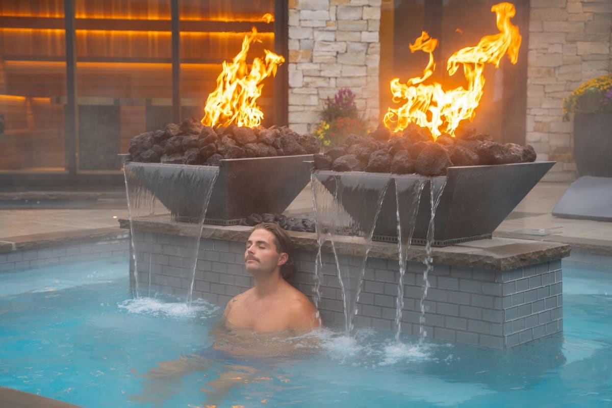 Man in the spa at Hôtel Manoir Saint-Sauveur.