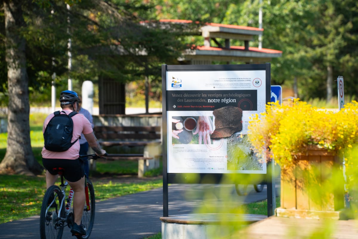 Cyclist on the P'tit train du Nord linear park.