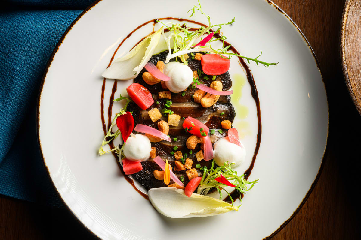 Elegantly plated dish at Cabu restaurant