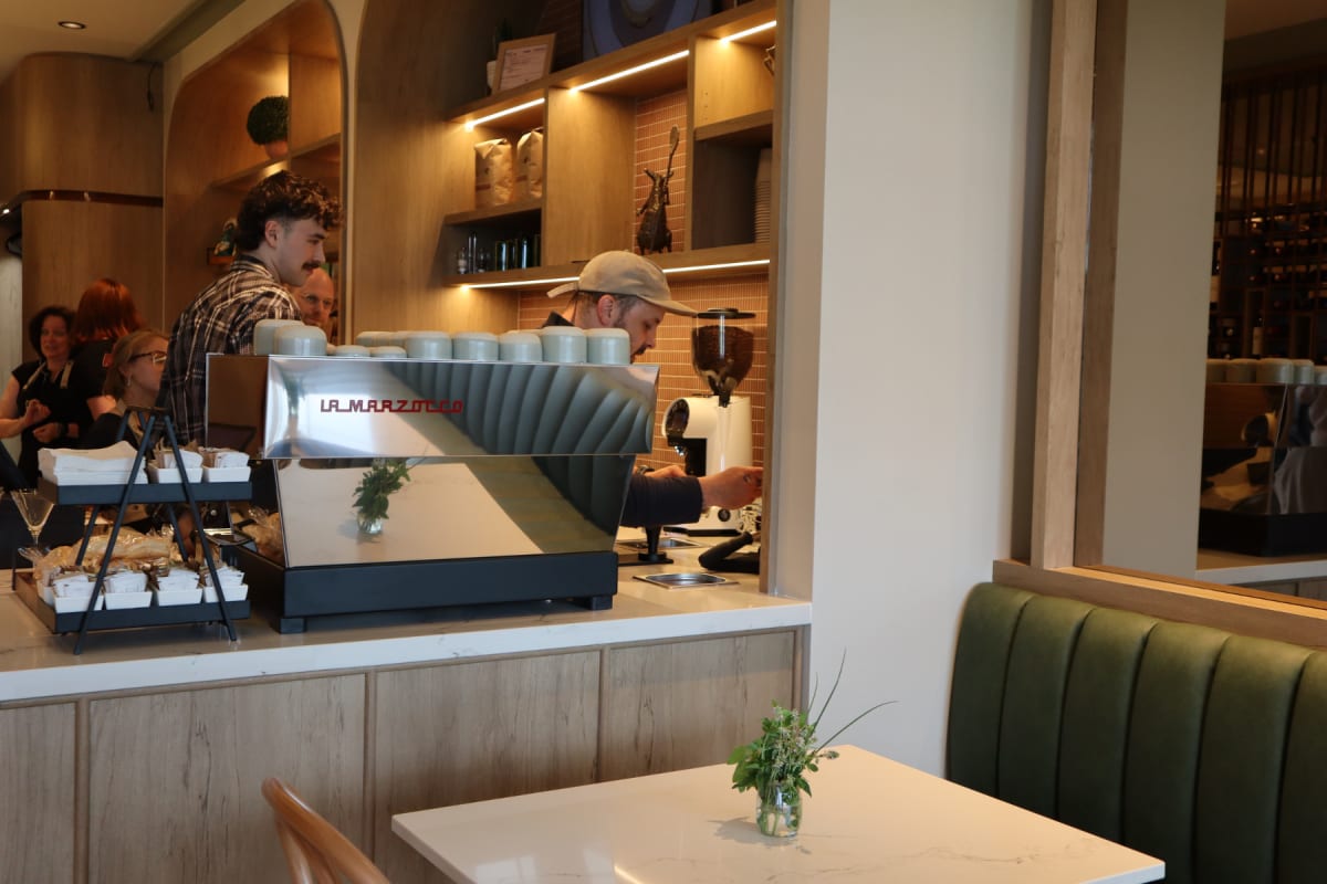 Barista at the café at Ratatouille.