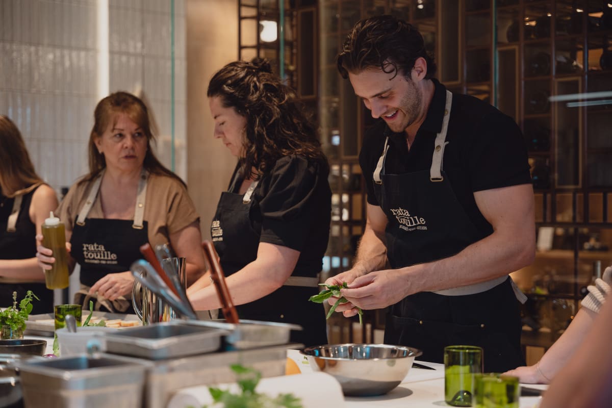 Participants at a cooking workshop at Ratatouille.
