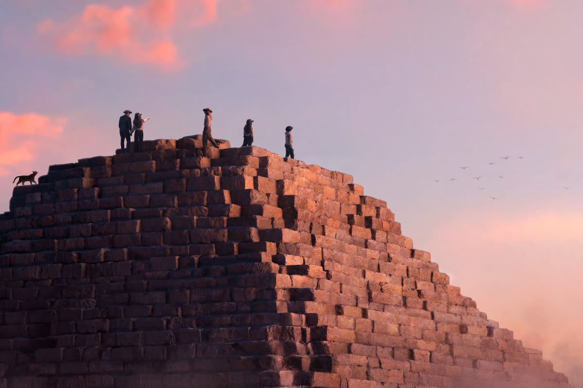 People seen in an virtual reality environment at the Horizon of Khufu exhibit.