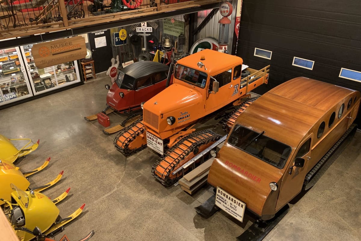 Vintage vehicles on skis and tracks at Musée Rodrigue