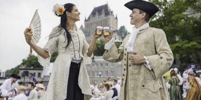 Les Fêtes de la Nouvelle-France - A man and a woman in costume from the 18th century