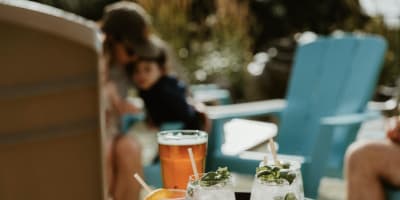 Le Roquemont - A tray of drinks on an outdoor table