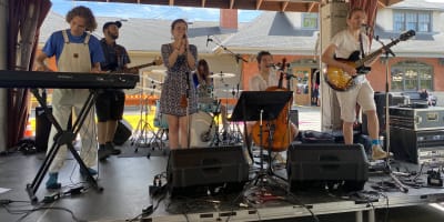 Sherbrooke en musique - Music band performing on an outdoor stage.