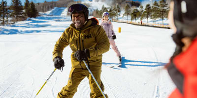 Man learning to ski.