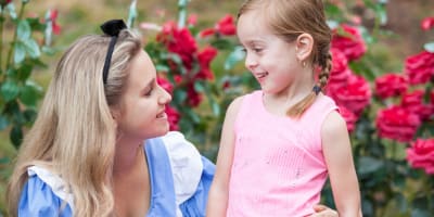 Cinderella with a child at Au Pays des Merveilles.