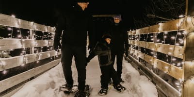 Family on a snowshoe hike.