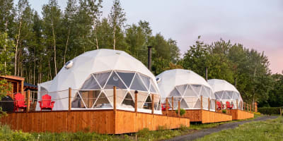 Three domes in the vineyard in summer. 