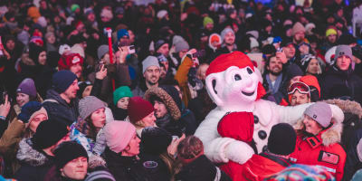 Bonhomme Carnaval in a crowd at Québec Winter Carnival.