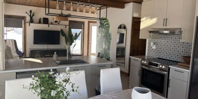Kitchen and living room of chalet.