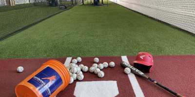 Indoor baseball practice field.
