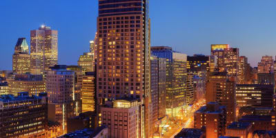 Hilton Garden Inn Montréal Centre-Ville illuminated.