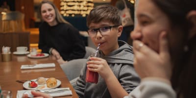 A family enjoying a meal.
