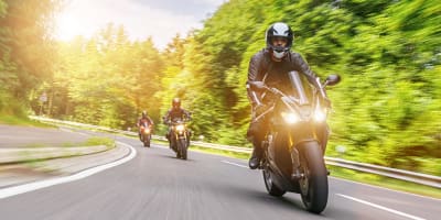 Motorcyclists on the road.