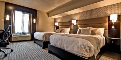 Room with two beds at the Hotel Nouvelle Frontière.