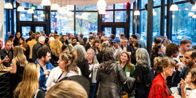 Hub Montréal - A room full of people chatting
