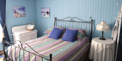 Bedroom La Mer at the B&B La Maison entre Mer et Montagnes.