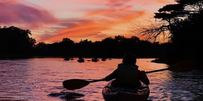 Kayaking at dusk in Parc de la Rivière-des-Mille-Îles.