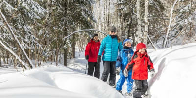 Family snowshoeing in winter.