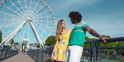 Couple in front of La Grande Roue de Montréal
