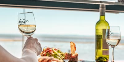 Dish and wine glass at Restaurant Allegro.