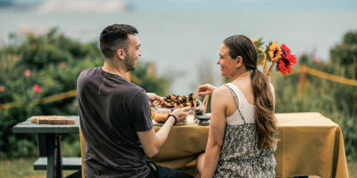 Couple at a picnic table
