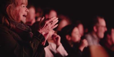 Spectators applauding.