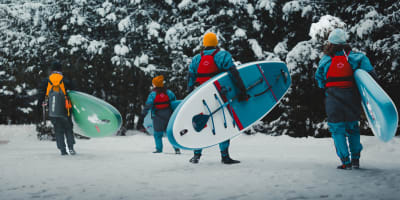 Winter paddleboard at SUP des glaces - Échappée Bleue.