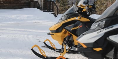 Two snowmobiles from Top Location Charlevoix.