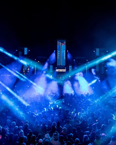 Electro show illuminated in blue at ArtikFest.