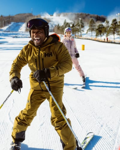 Man learning to ski.