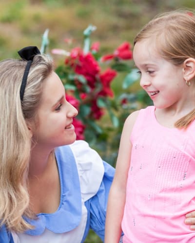 Cinderella with a child at Au Pays des Merveilles.