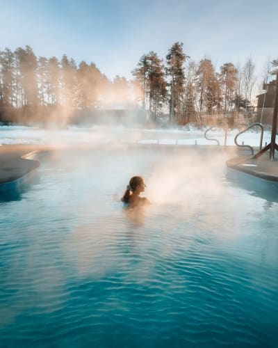 Outdoor heated pool in winter at Auberge du Lac Taureau.