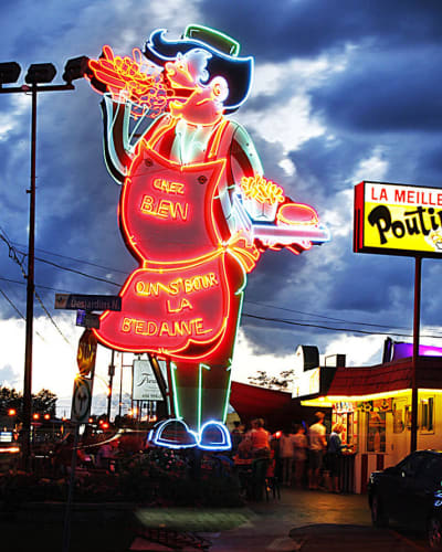 Enseigne néon de Cantine Chez Ben on s’bour la bedaine.