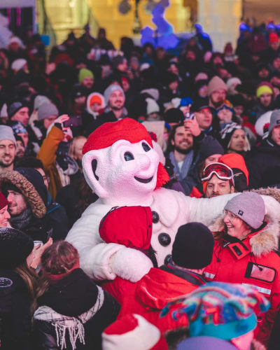 Bonhomme Carnaval in a crowd at Québec Winter Carnival.