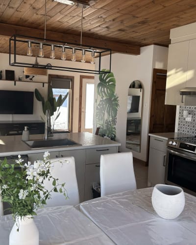 Kitchen and living room of chalet.