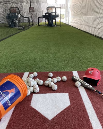 Indoor baseball practice field.