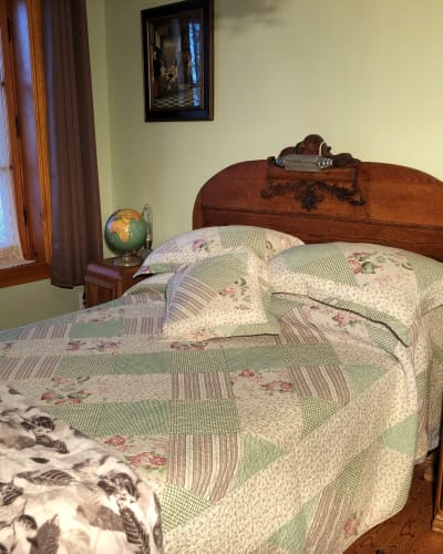 A bed at Gîte du Mitan.