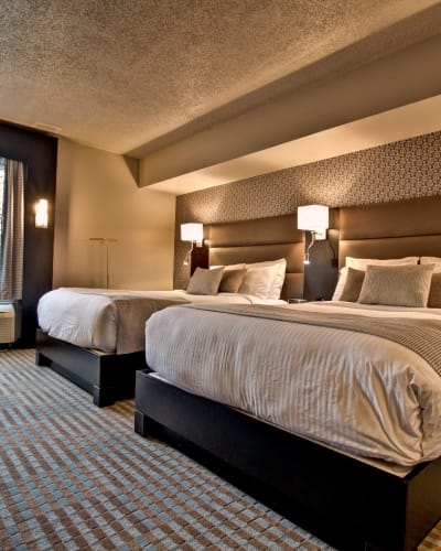 Room with two beds at the Hotel Nouvelle Frontière.