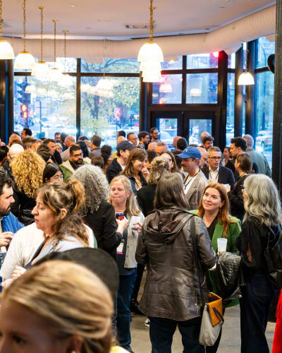 Hub Montréal - A room full of people chatting