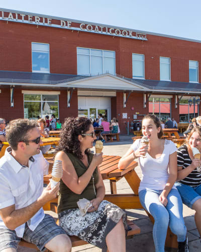 A family enjoying ice cream.