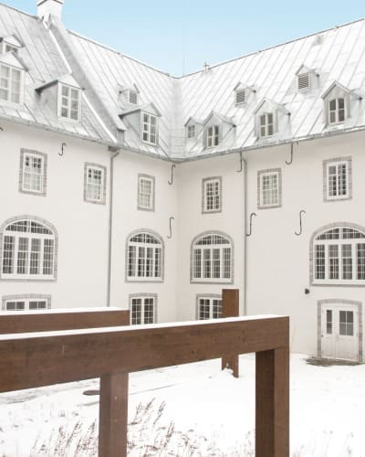 Exterior of the Monastère des Augustines in winter.