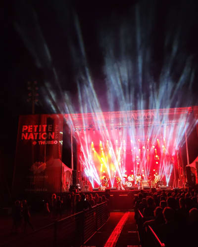 Outdoor stage illuminated at night