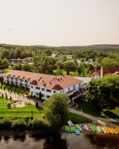 Aerial view of Manoir du Lac William in summer.